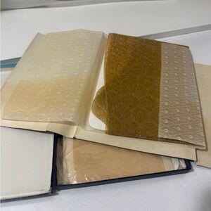 Cameo Stockings in shiny gold. Two socks in the box. Vintage